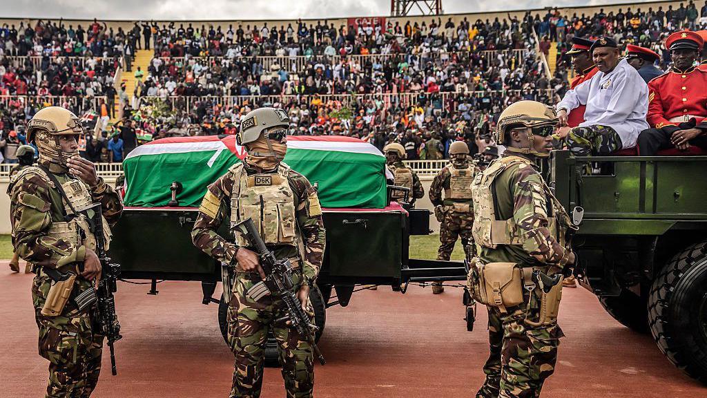 Heavily armed soldiers guarding Odinga's casket 