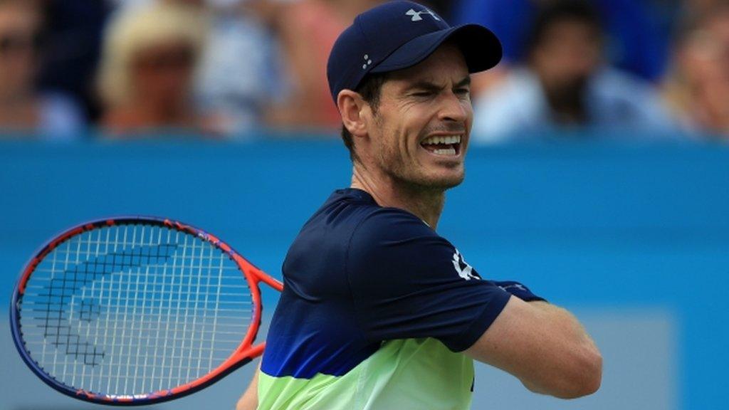 Andy Murray plays a shot during his defeat by Nick Kyrgios