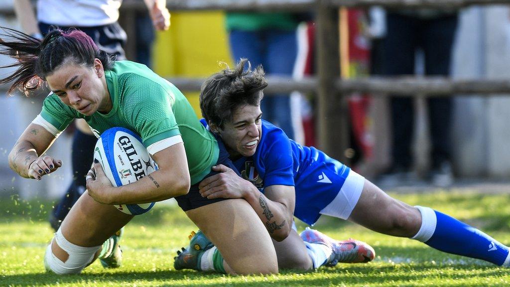 Ireland's Natasja Behan is tackled by Alyssa D’Incà in Italy