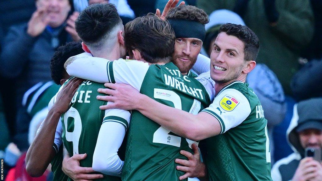 Plymouth Argyle celebrate scoring against Cheltenham Town