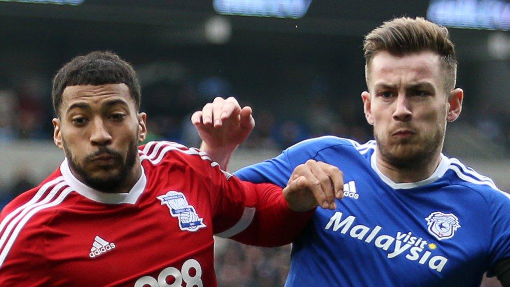David Davis of Birmingham City is challenged by Cardiff's Joe Ralls
