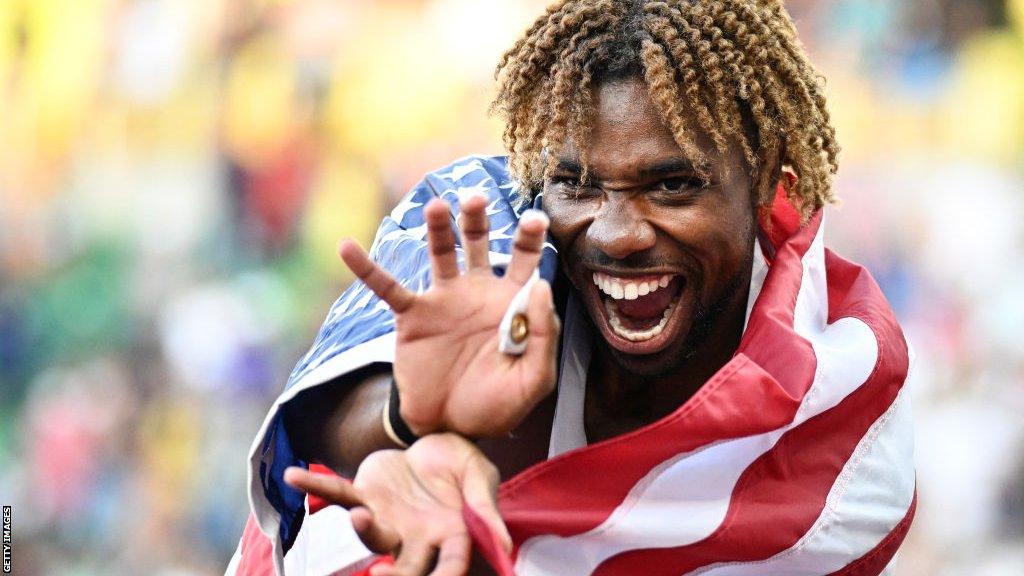 Noah Lyles celebrates after becoming world 200m champion