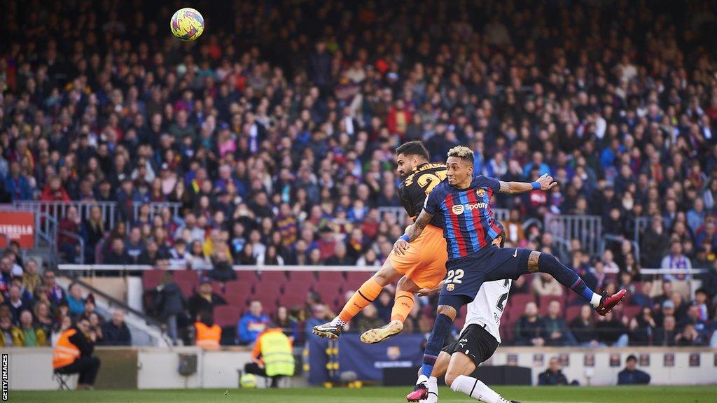 Raphinha heads home the only goal of the game for Barcelona against Valencia