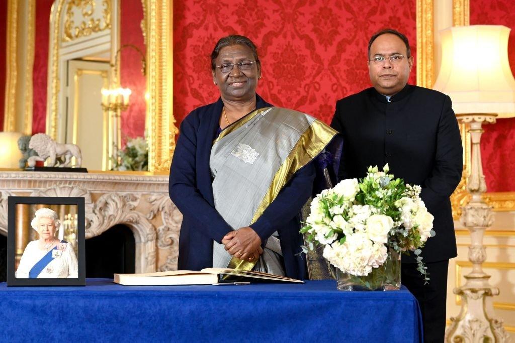 The President of India, Droupadi Murmu (on the left) and acting High Commissioner Sujit Ghosh signed a book of condolence for the Queen in London ahead of the funeral.