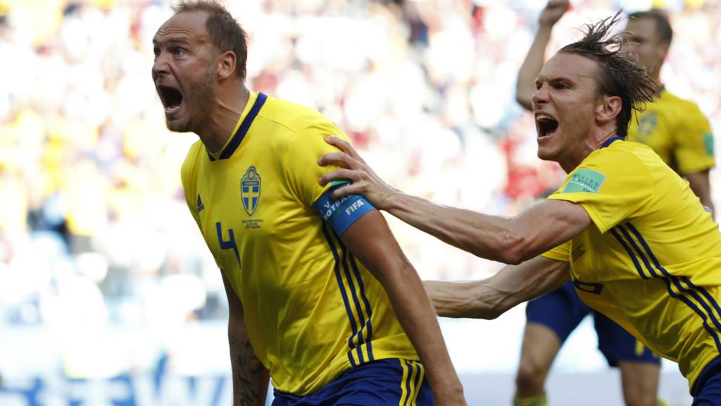 Sweden celebrates after converting a penalty