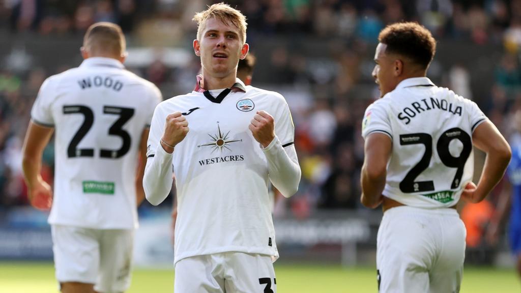 Ollie Cooper celebrates