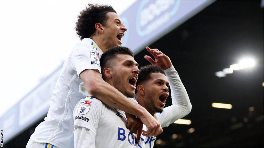 Joel Piroe and Georginio Rutter celebrate the fourth goal