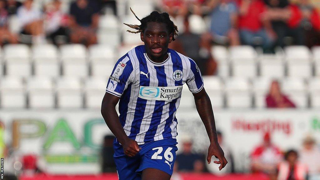 Wigan player Baba Adeeko