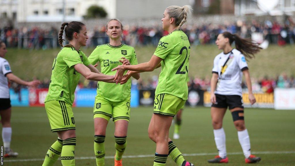 Manchester United Women celebrate scoring against Lewes in the FA Cup