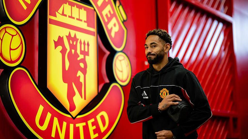 Matheus Cunha arrives at Old Trafford for a Manchester United game
