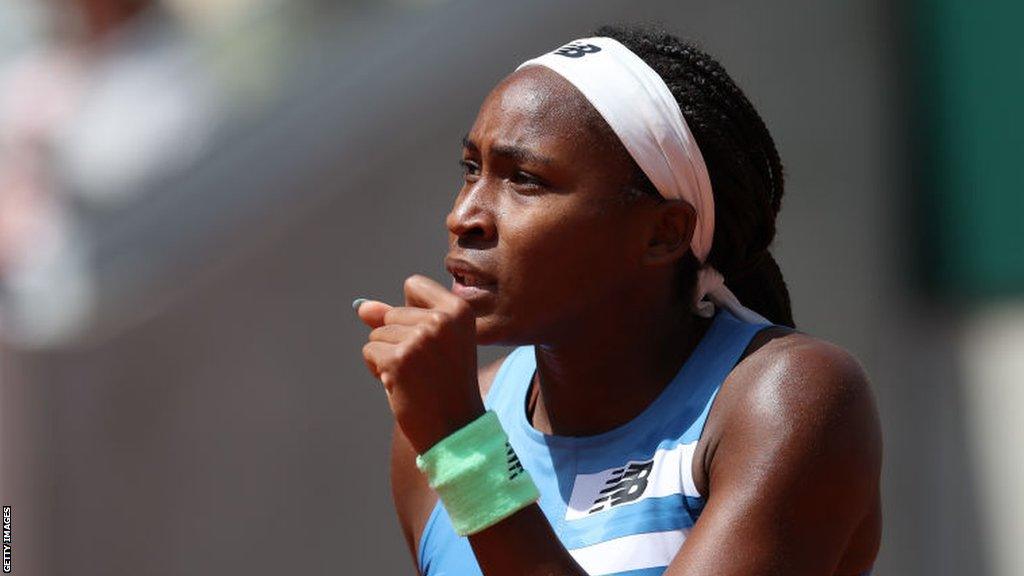 Coco Gauff celebrates during her French Open first-round victory