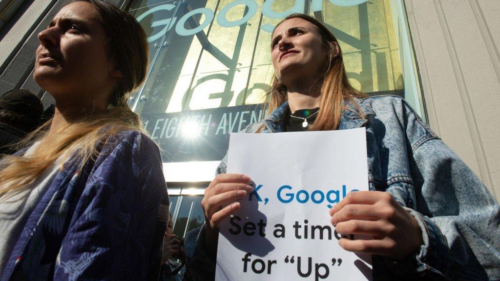 Google staff walk out their office in New York in November 2018