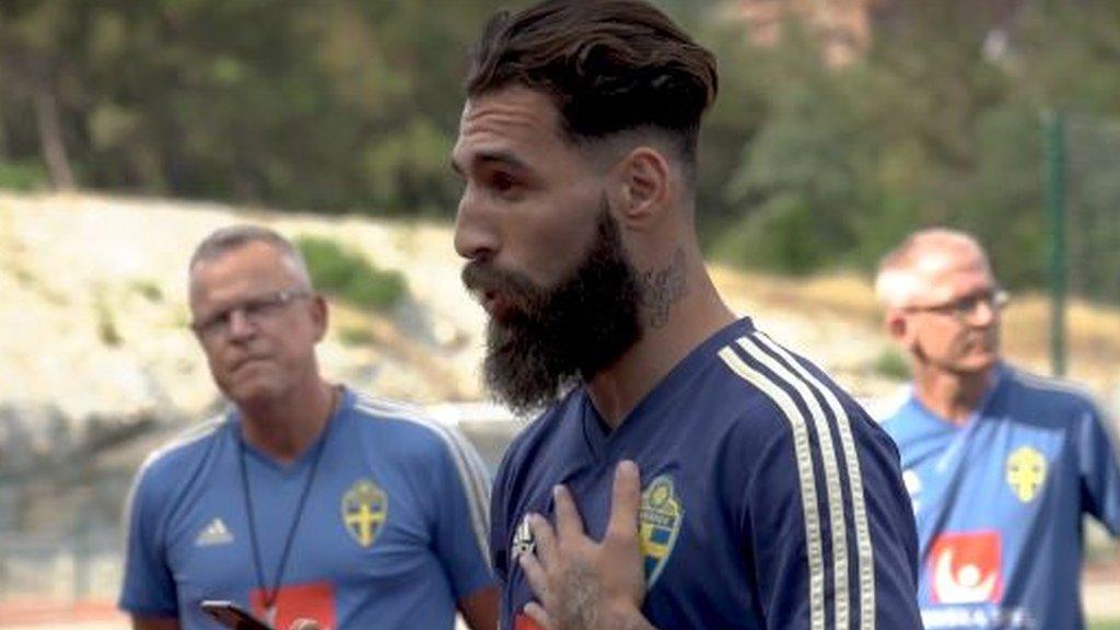 Sweden's Jimmy Durmaz reads statement