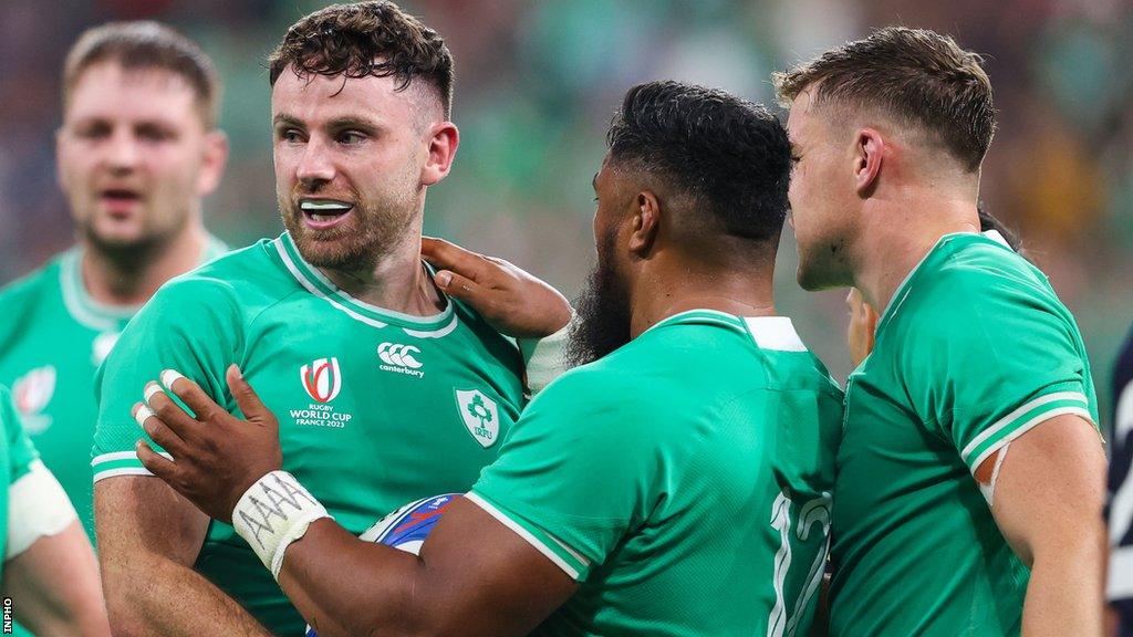 Hugo Keenan celebrates scoring a try