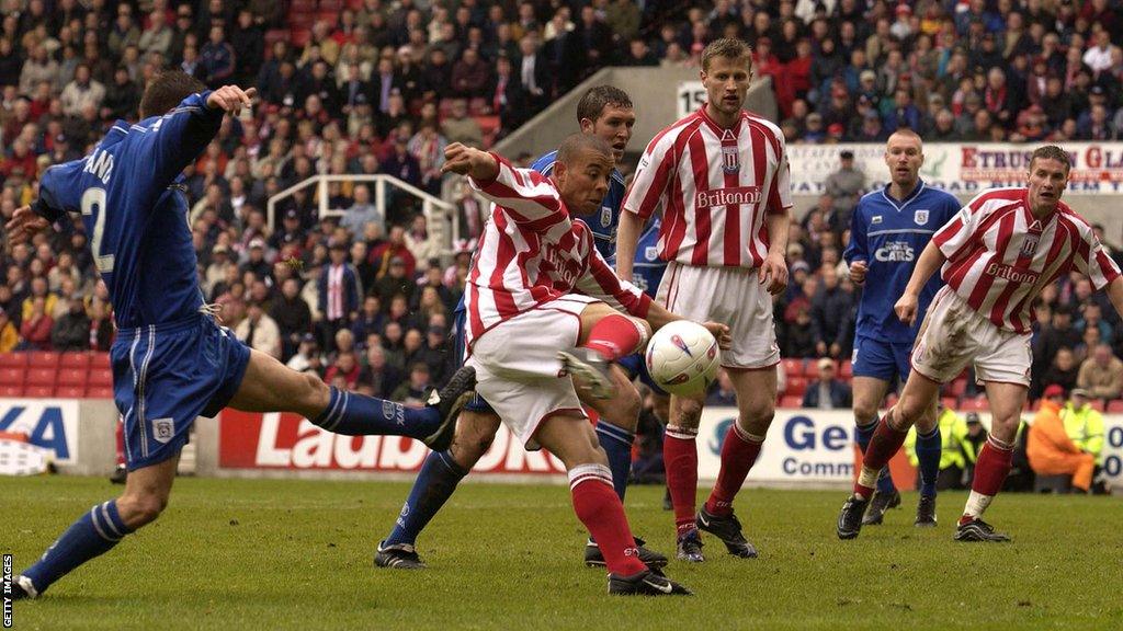 Deon Burton scores for Stoke during the first leg of the second Division play off between Stoke City and Cardiff City