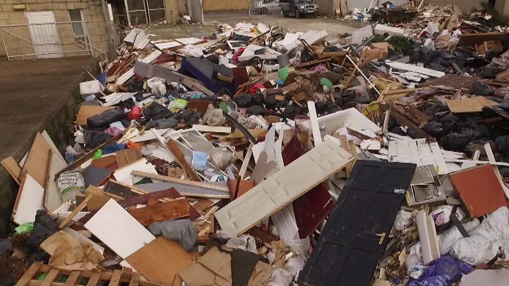 Rubbish dumped illegally on private land