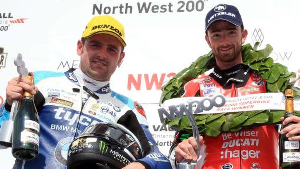 Michael Dunlop and Glenn Irwin on the Superbike podium together at the 2018 North West 200