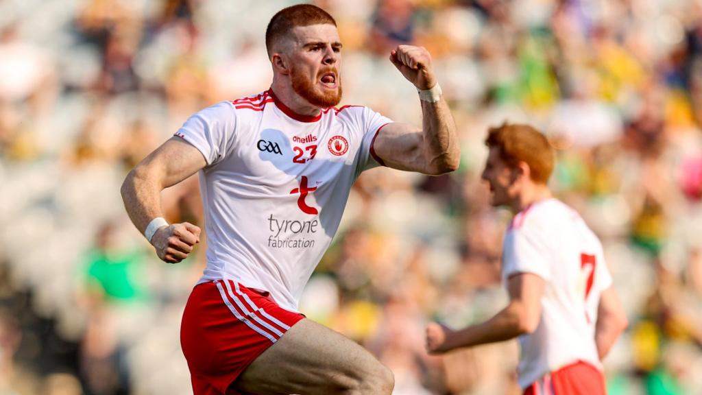 Cathal McShane celebrates after scoring Tyrone's second goal