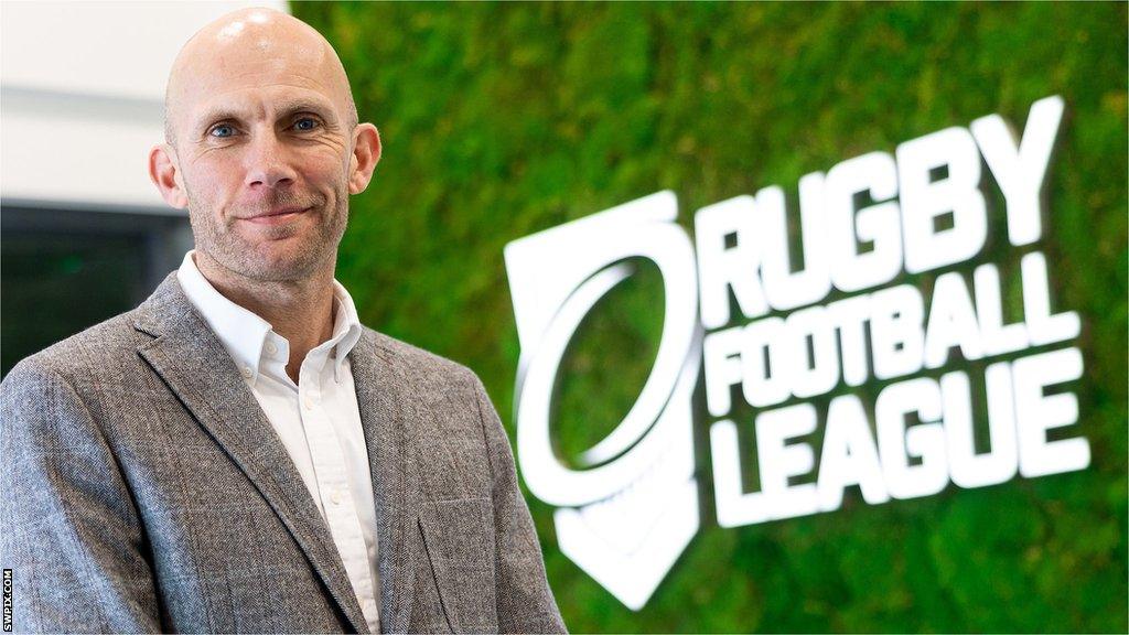 Tony Sutton in front of the RFL logo