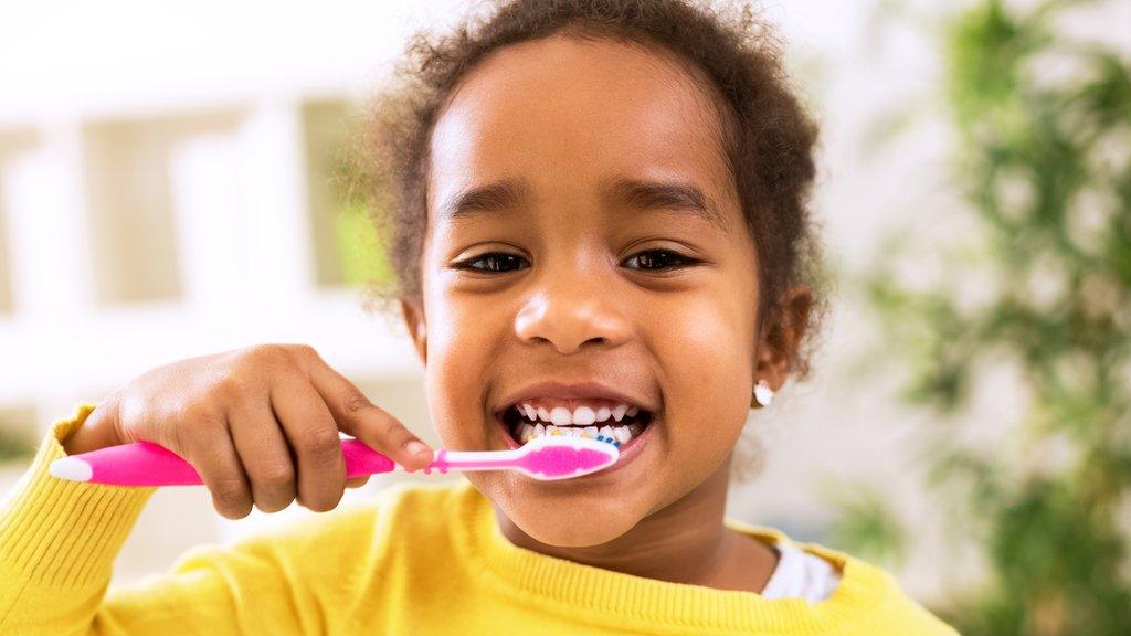 girl-brushing-teeth.