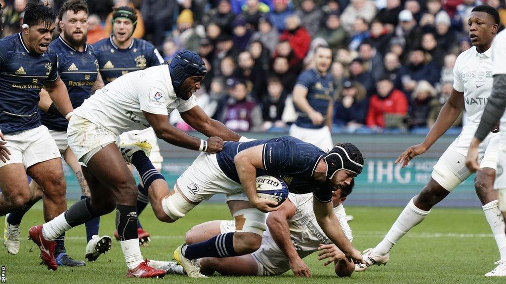 Leinster flanker Ryan Baird bursts through at attempted tackle in Le Havre