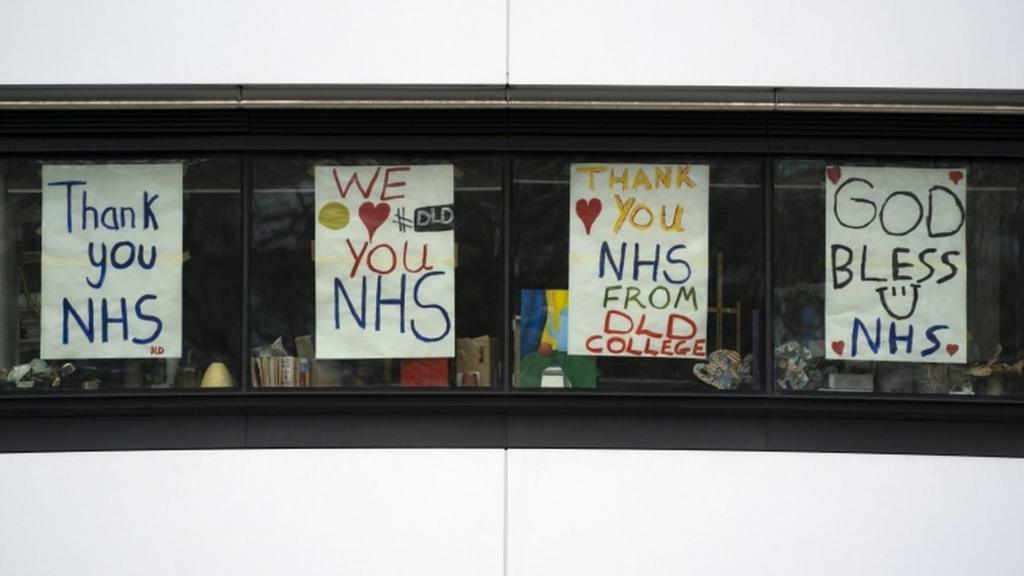 Signs praising the National Health Service (NHS)