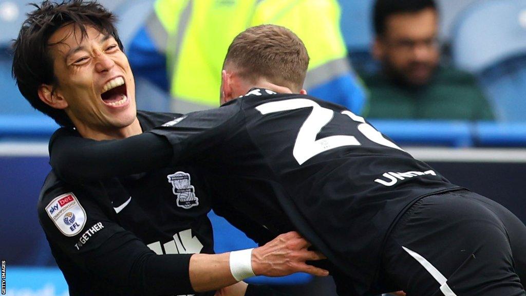 Birmingham City's Koji Miyoshi (left) celebrates his first-half opener against Huddersfield Town