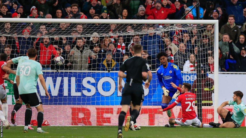 Ryan Barnett scores Wrexham's opening goal in the 4-1 win over Crawley Town