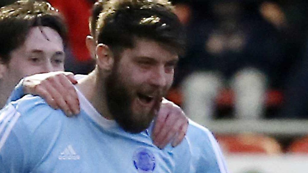 Will Evans celebrates a goal for Aldershot
