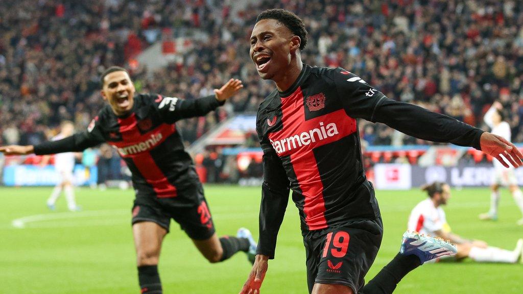 Nathan Tella celebrating scoring Bayer Leverkusen's fourth goal