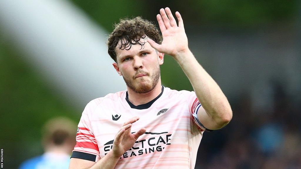 Tom Holmes waves to Reading fans