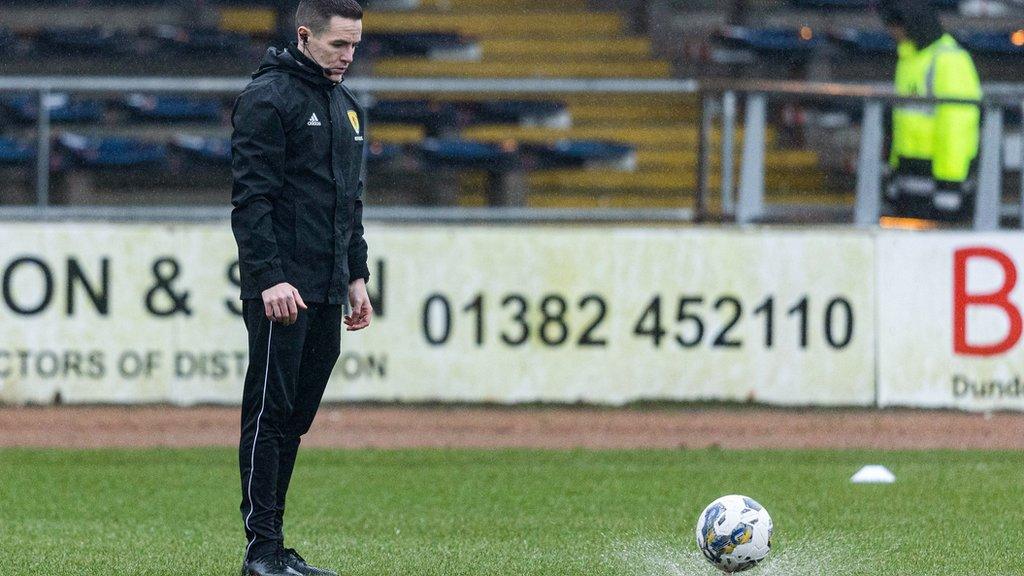 The pitch at Dens Park was deemed unplayable due to multiple areas of standing water