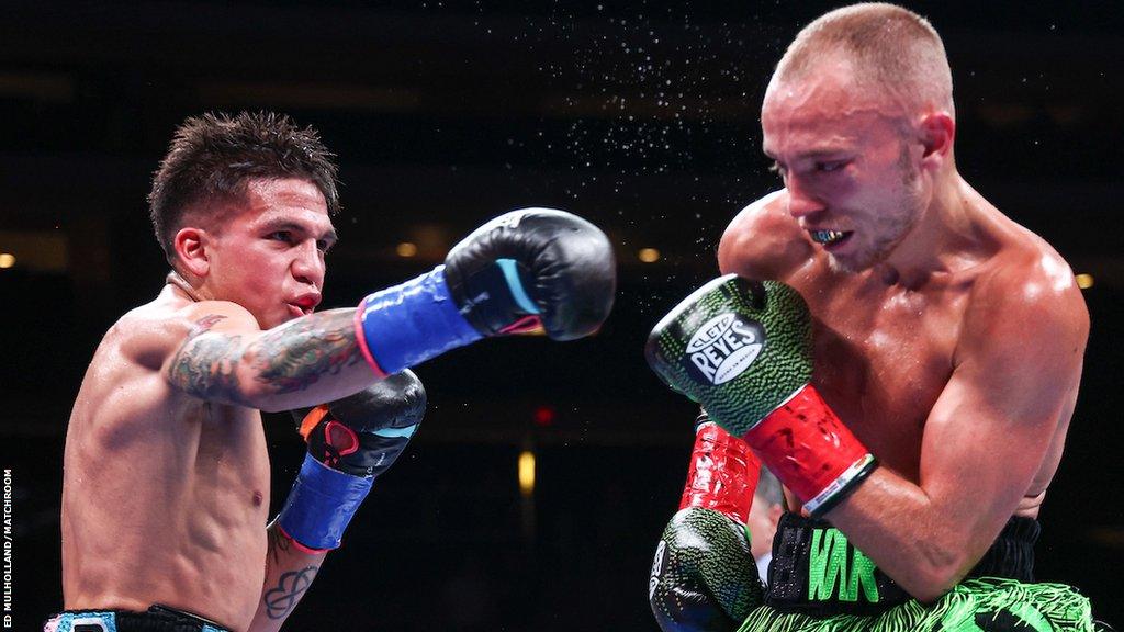 Jesse Bam Rodriguez throws a right jab at Sunny Edwards