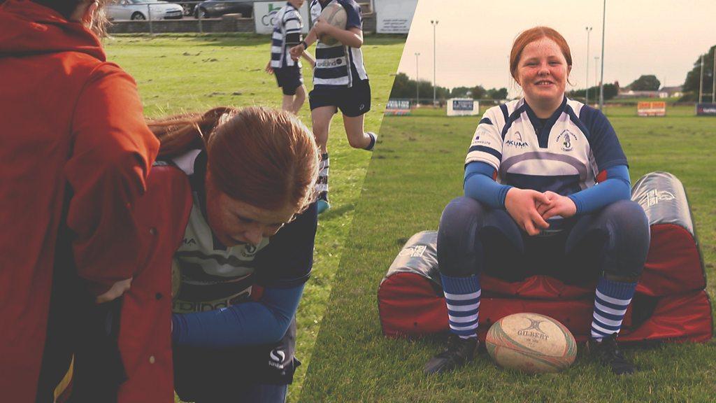 A young rugby player called Alex sitting down ready to be interviewed.