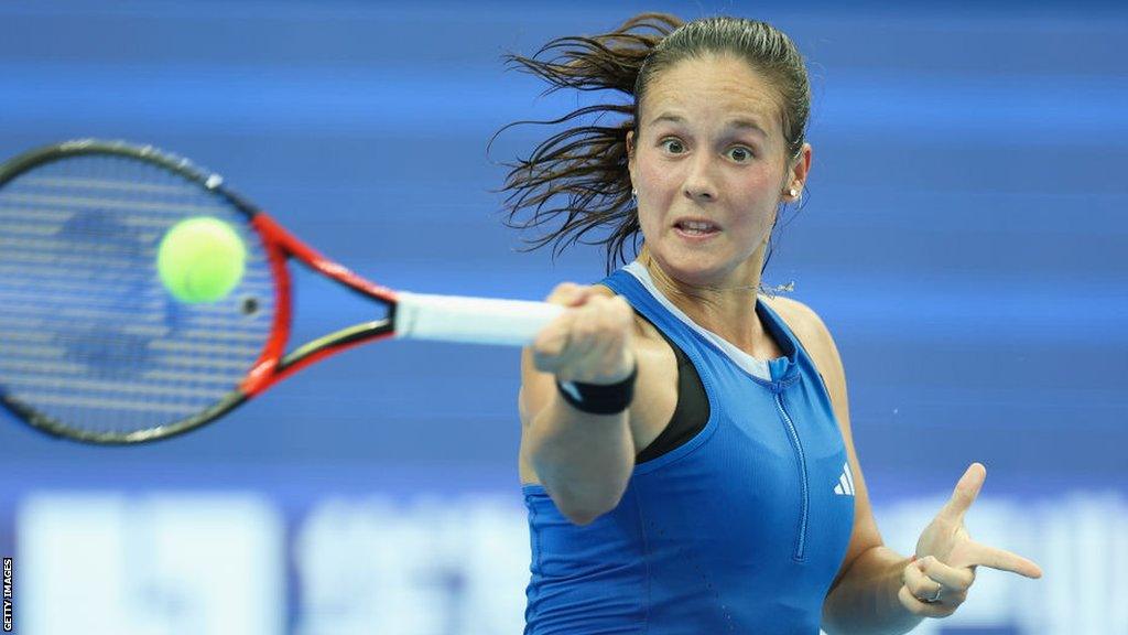 Daria Kasatkina hits a forehand return