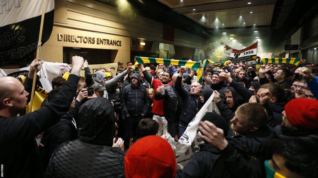 Manchester United fans protest against the Glazer family’s ownership of the club outside Old Trafford before their match against Aston Villa in April 2023