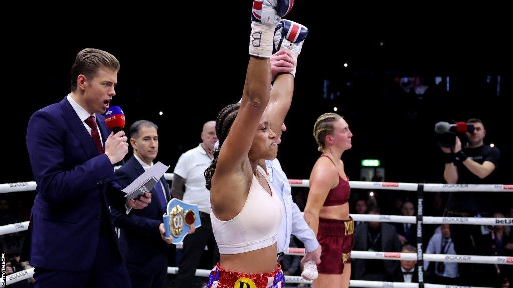 Natasha Jonas celebrates as the scorecards are read out