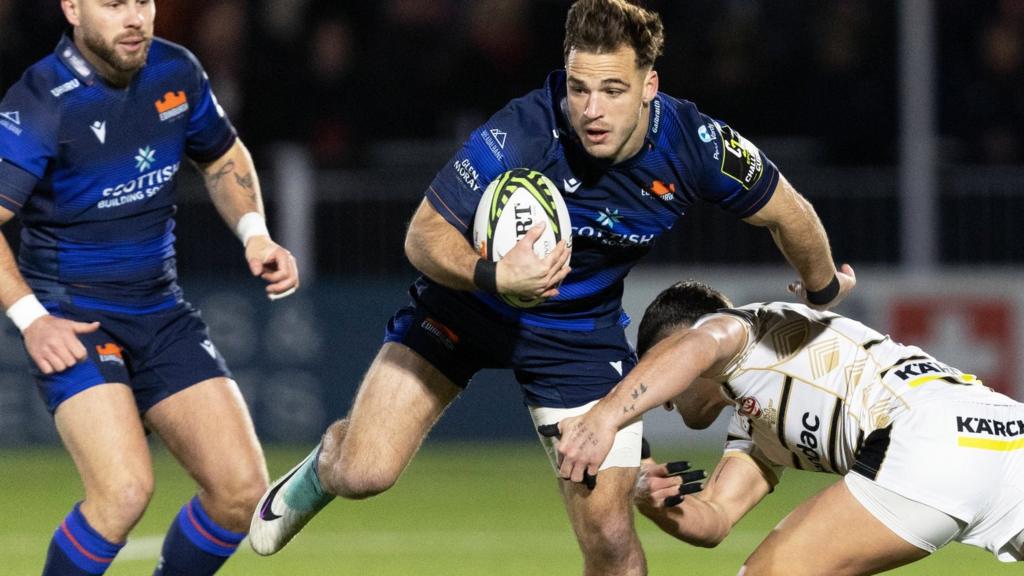 Edinburgh's Wes Goosen and Gloucester's Adam Hastings in action