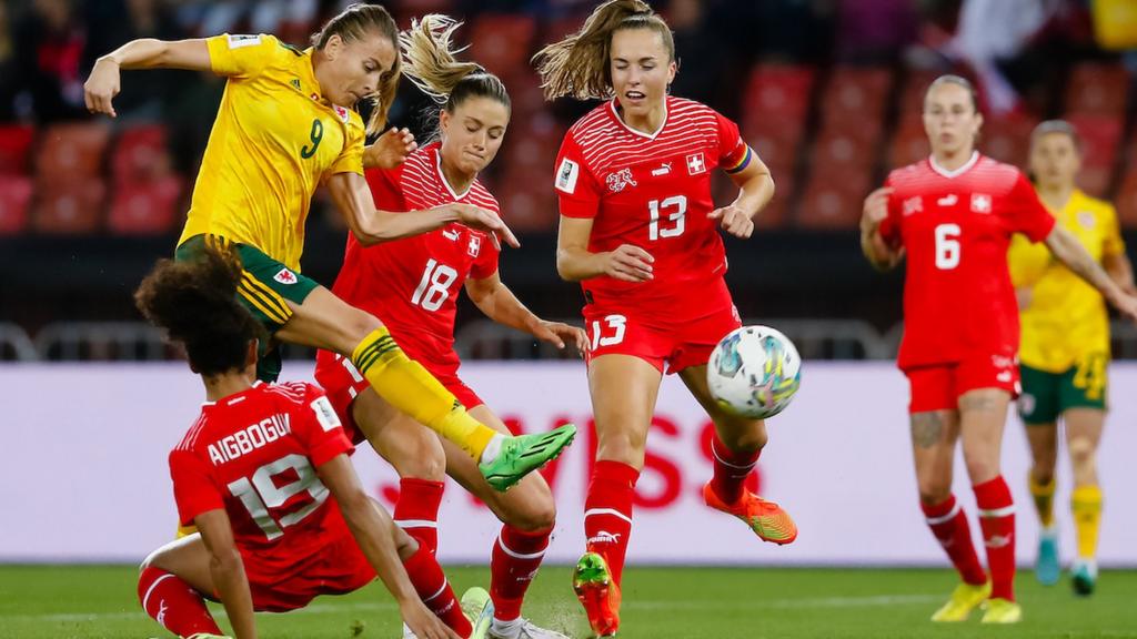 Wales' Kayleigh Green and Switzerland's Viola Calligaris, Switzerland's Lia Wälti and Switzerland's Eseosa Aigbogun