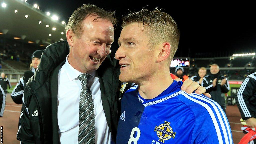 O'Neill and Davis pictured after NI's win over Finland in 2015