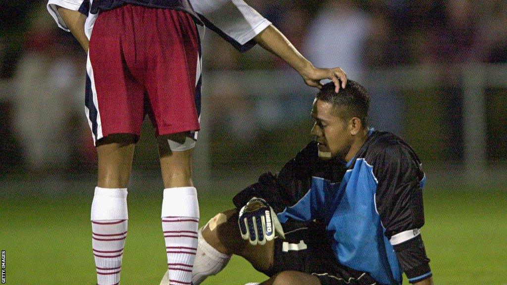 Nicky Salapu is consoled by teammate Young Im Min.