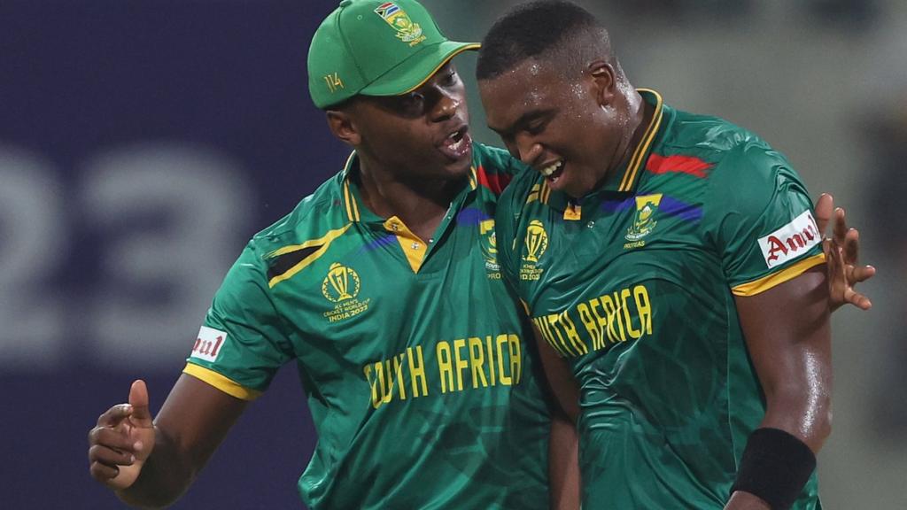 South Africa's Kagiso Rabada (left) and Lungi Ngidi (right ) celebrate a wicket