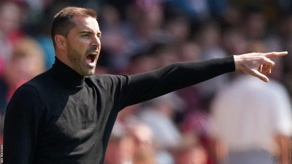 Reading boss Ruben Selles directs his players from the touchline during a League One match.