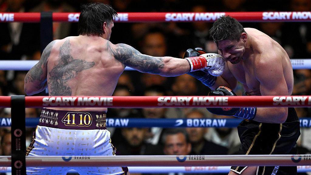 Oleksandr Usyk punches Rico Verhoeven