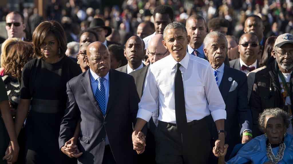 Michelle Obama, John Lewis and Barack Obama lead marchers in Selma, Alabama