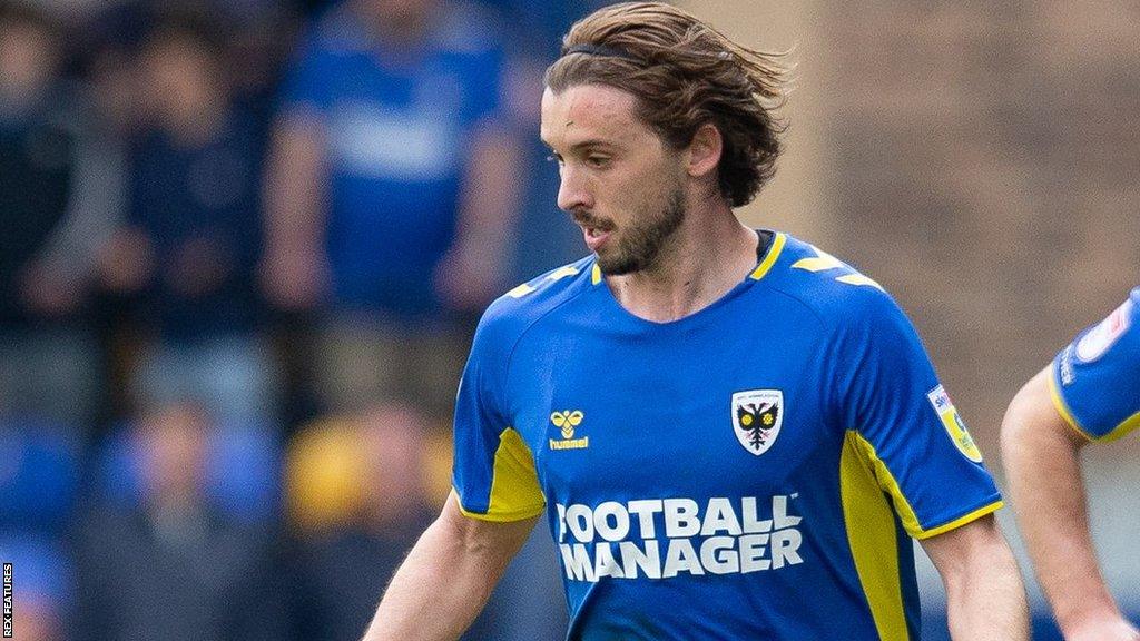 Ethan Chislett in action for AFC Wimbledon