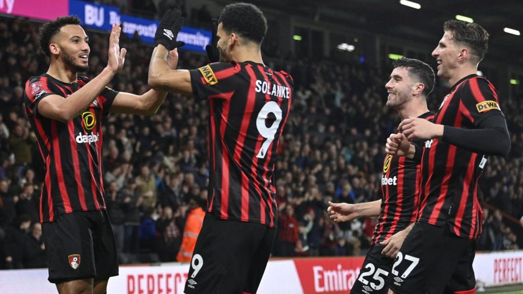 Bournemouth players celebrate scoring against Swansea