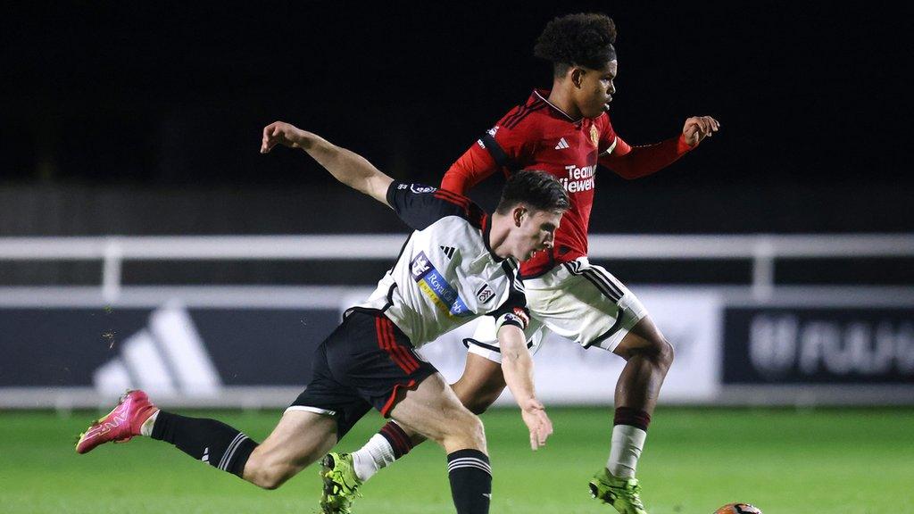 Ollie O'Neill playing against Manchester United in Premier League 2