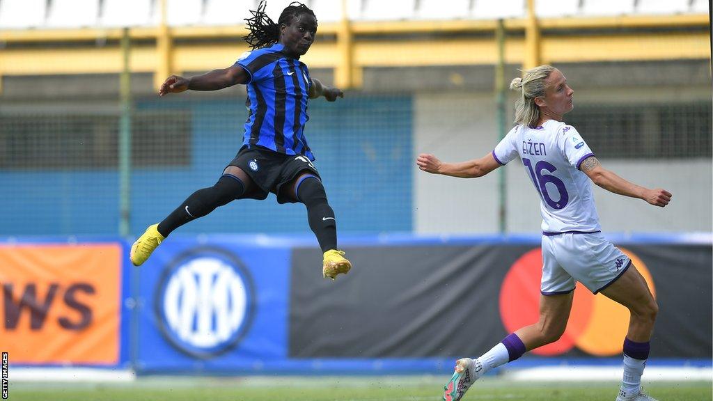 Malawi international Tabitha Chawinga playing football