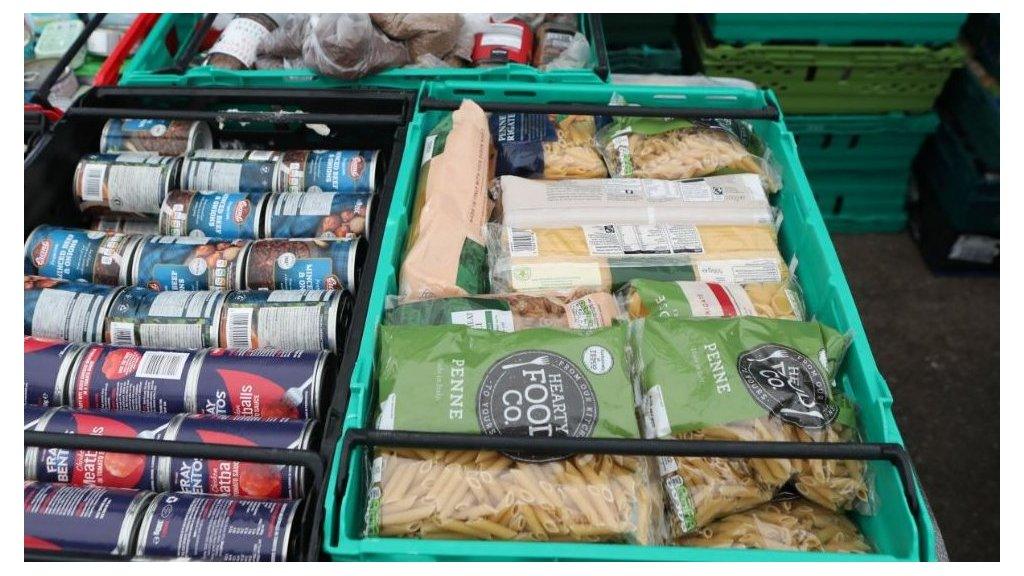 Food laid out in crates at a food bank